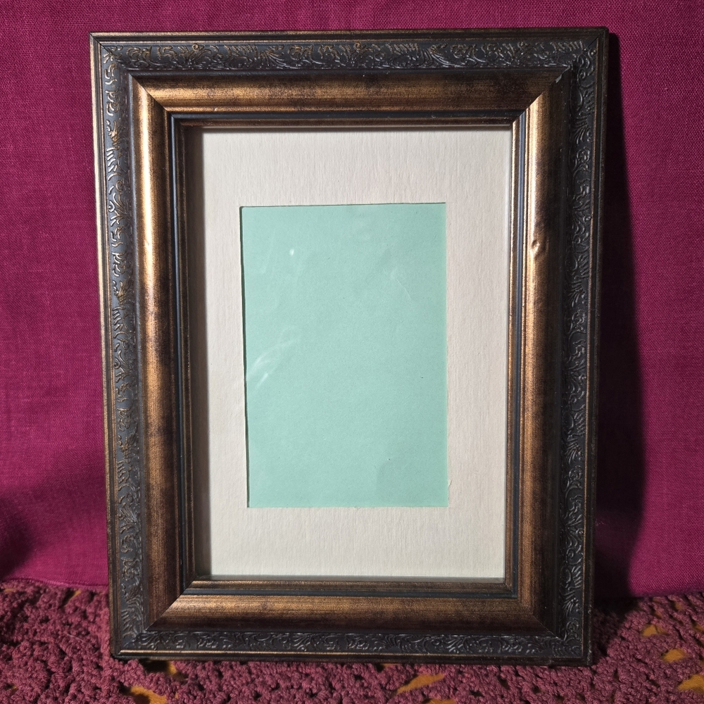 Elegant Brown and Gold Picture Frame with Classic Accents